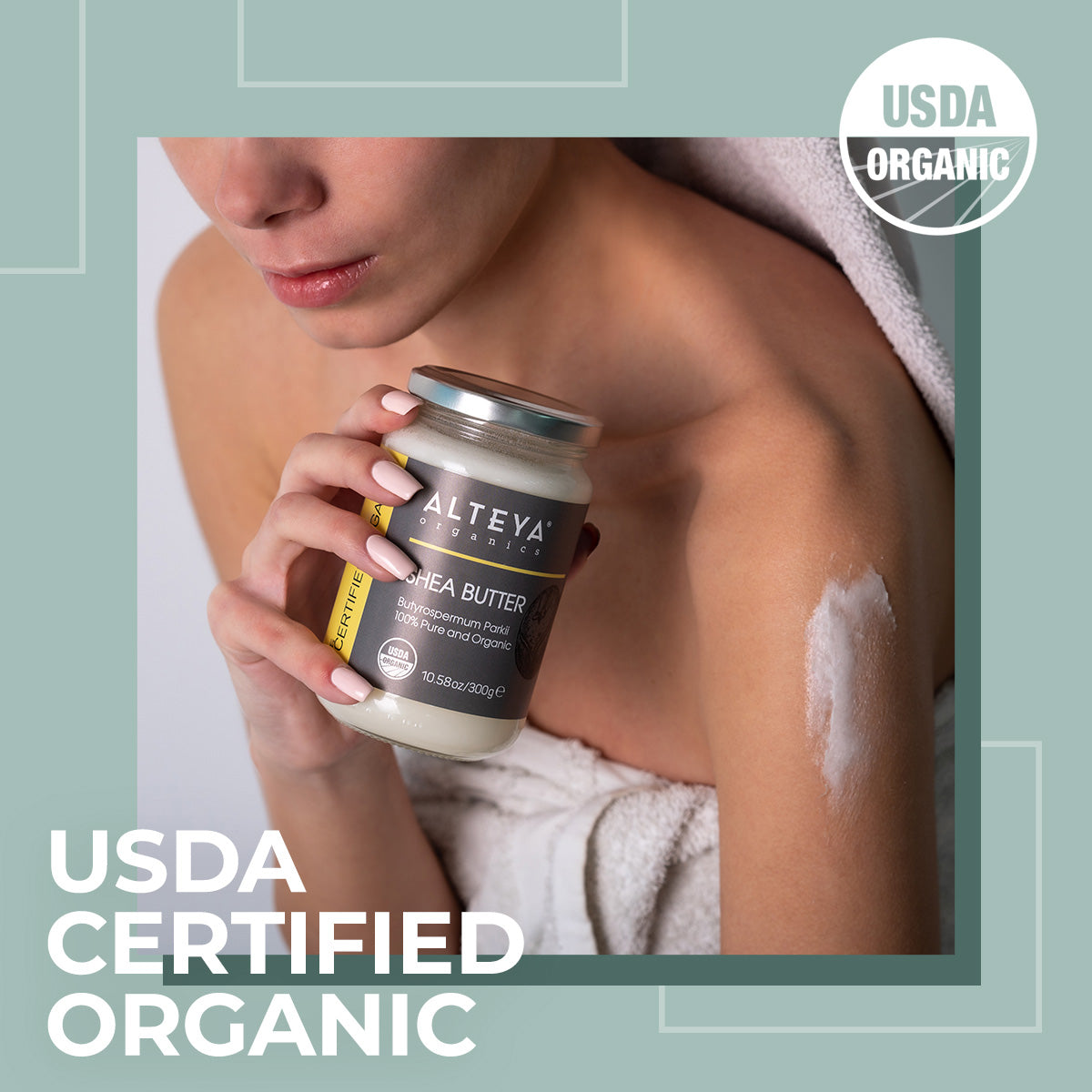 A woman holding a jar of Alteya Organics' Shea Butter - USDA Organic - 10.58 Oz/300g Glass Jar to moisturize and protect skin.