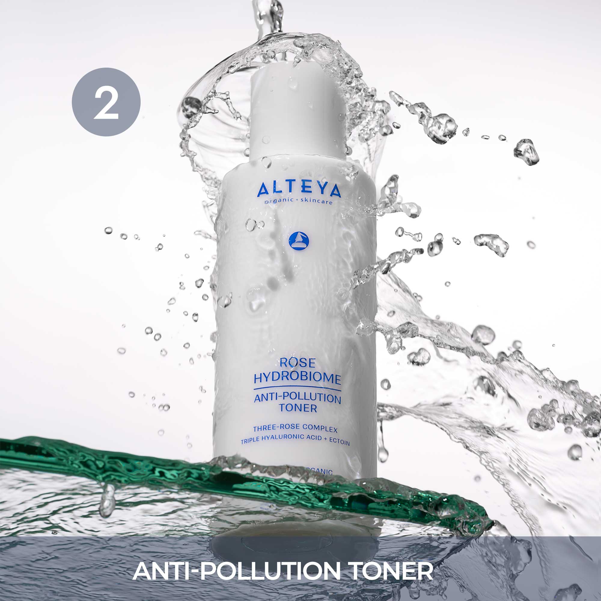 A bottle of anti pollution toner with a splash of water.