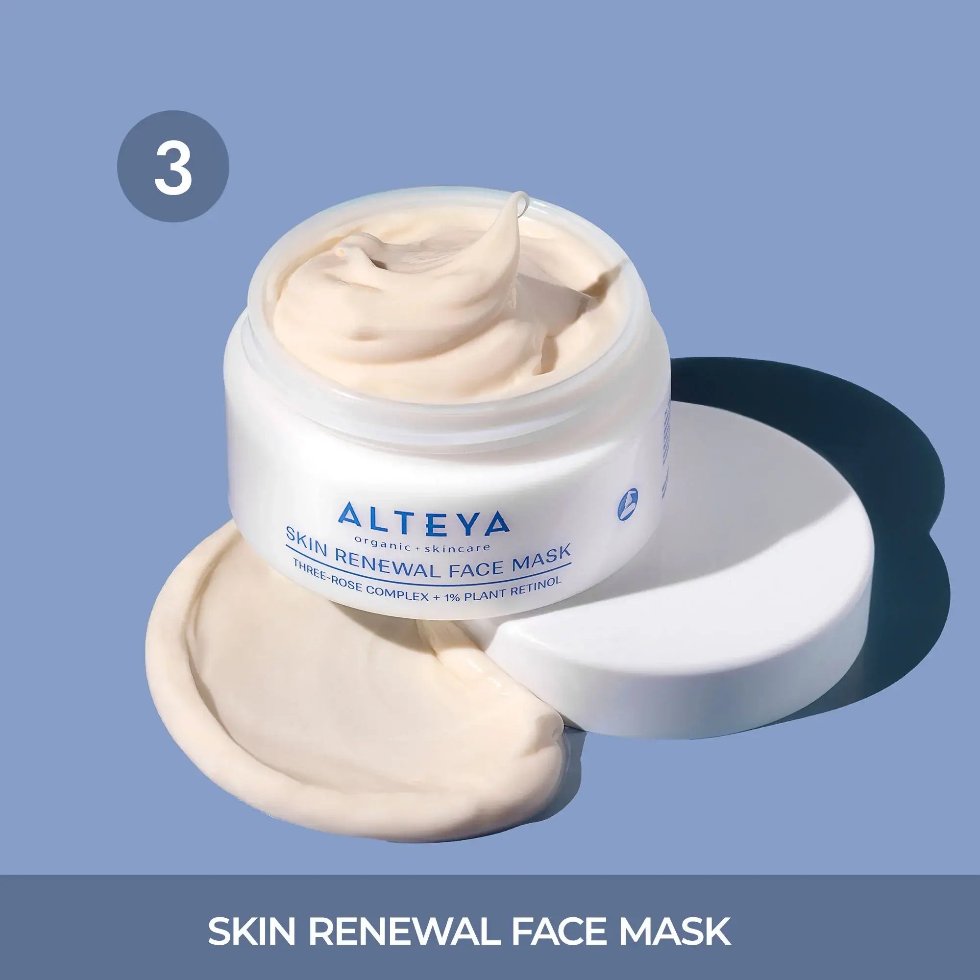 A jar of alteya skin renewal face mask on a blue background.