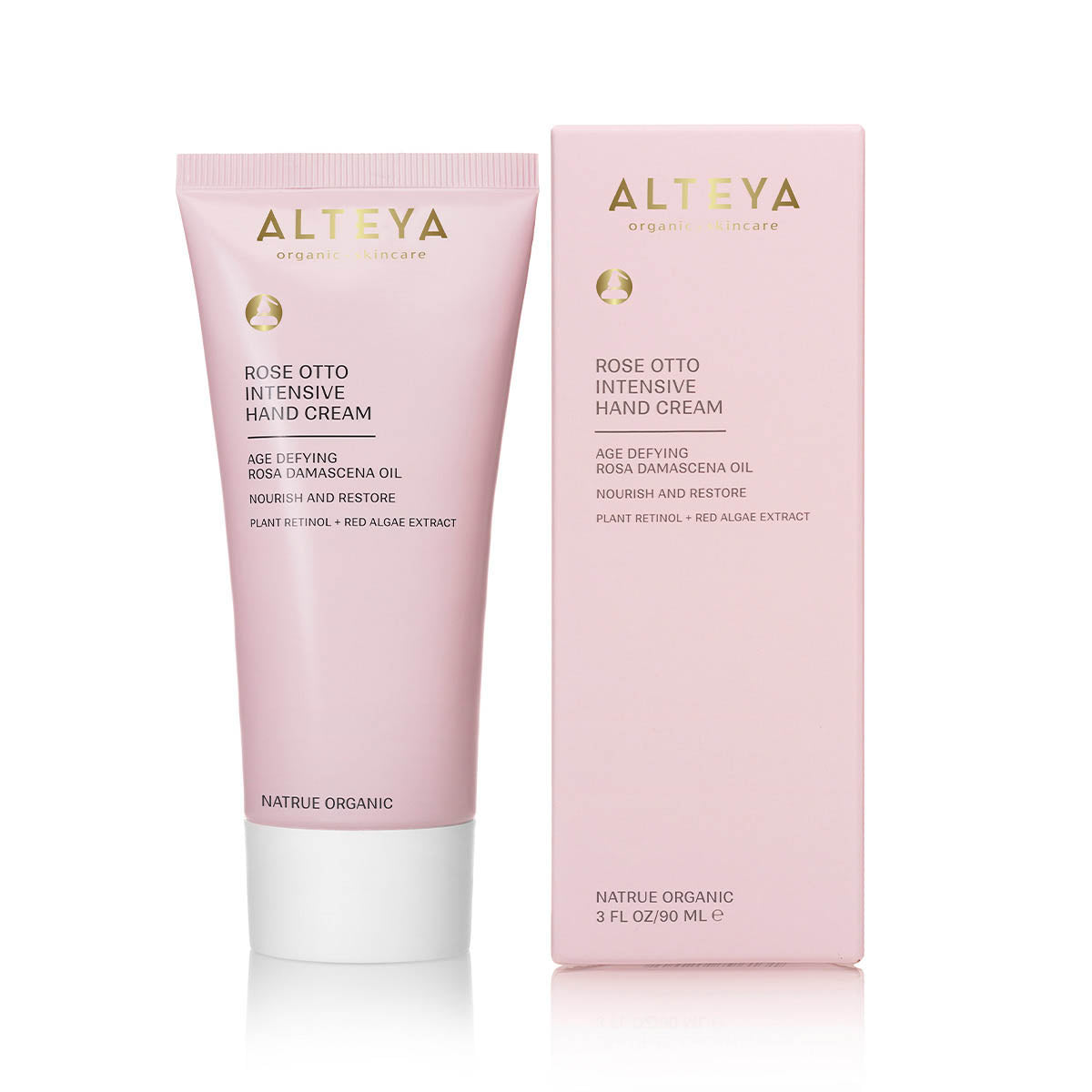 A tube and box of Organic Rose Otto Intensive Hand Cream, labeled as age-defying with Bulgarian Rose Otto, plant retinol, and red algae extract.