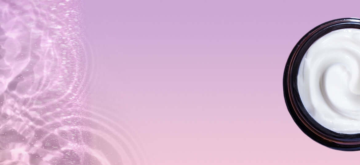 A jar of cream on a purple background.