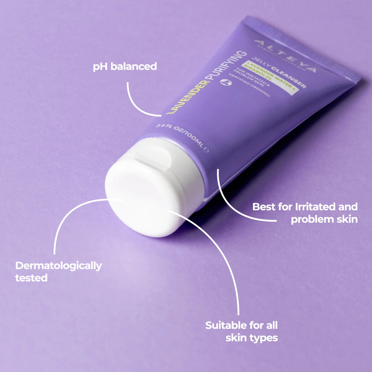 A tube of Alteya Organics Lavender Purifying Jelly Cleanser on a purple background with organic lavender water.