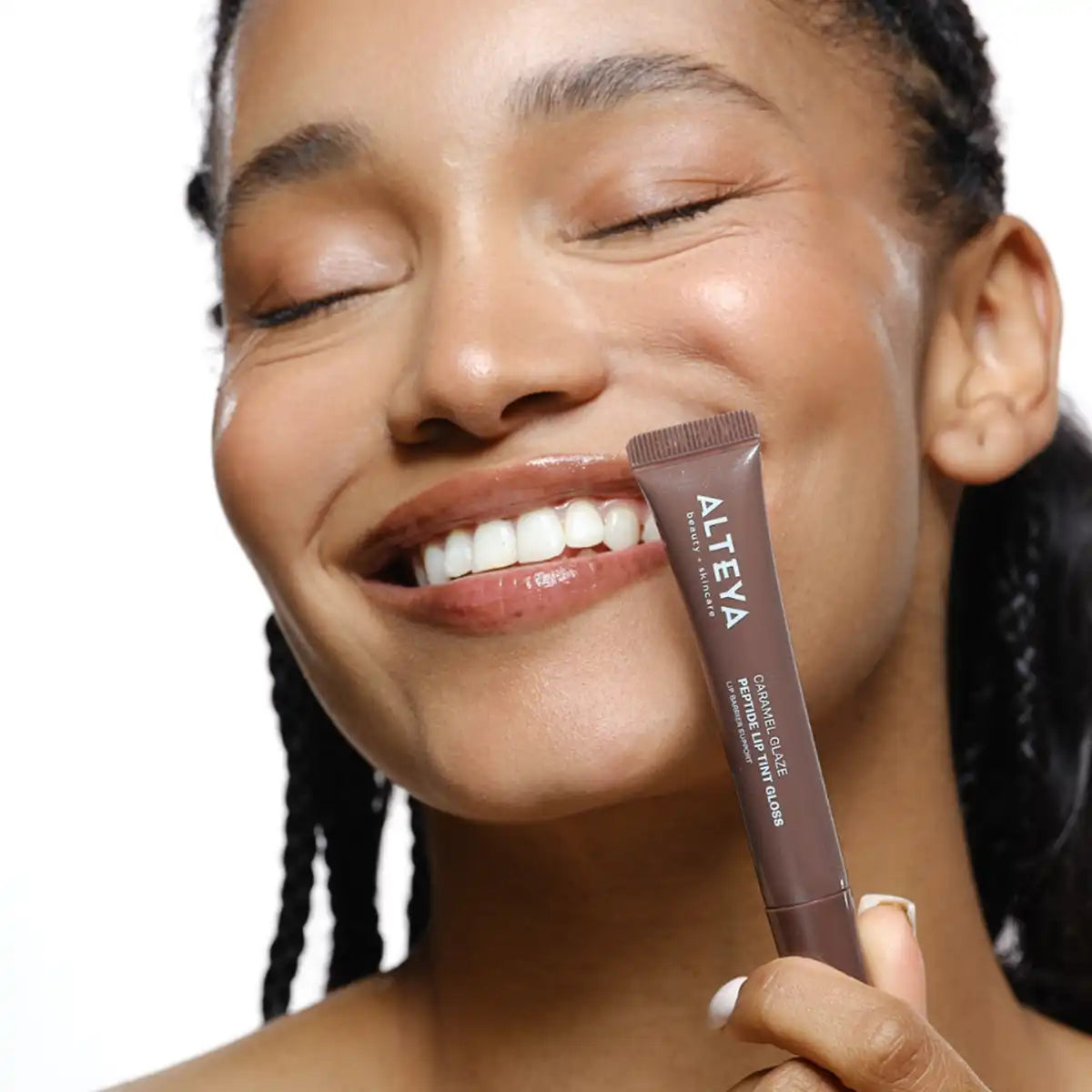 Caramel glaze lip gloss and model