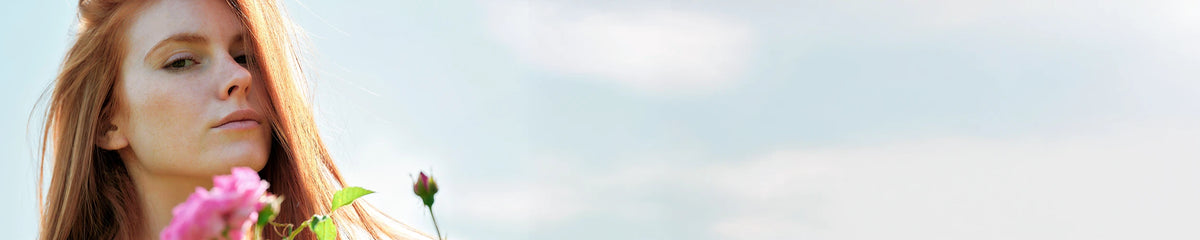 Model in rose fields subscription background