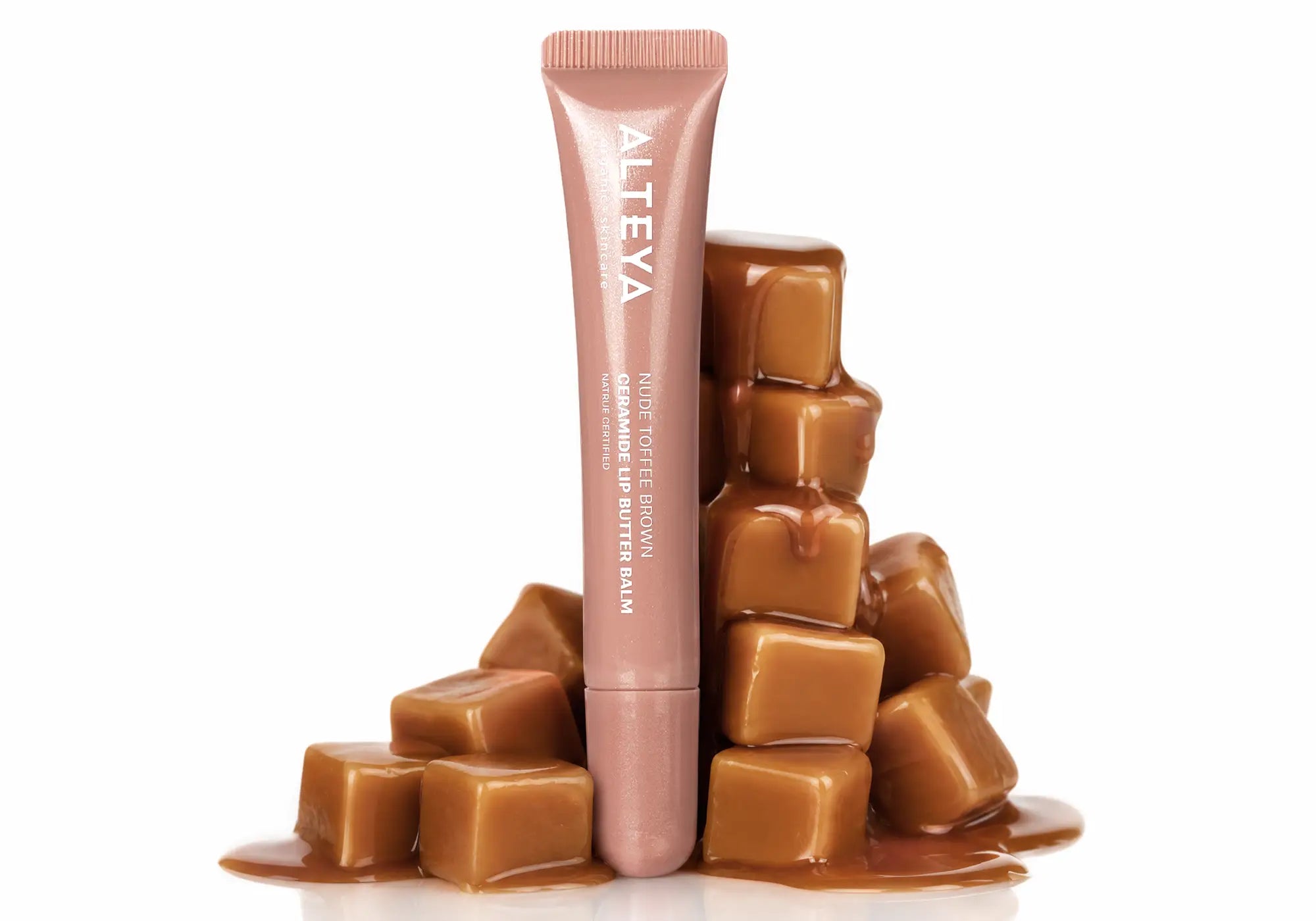 Caramel candies and nude toffee brown lip gloss