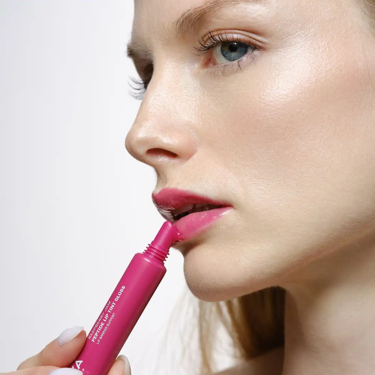 Raspberry jam lip gloss and model