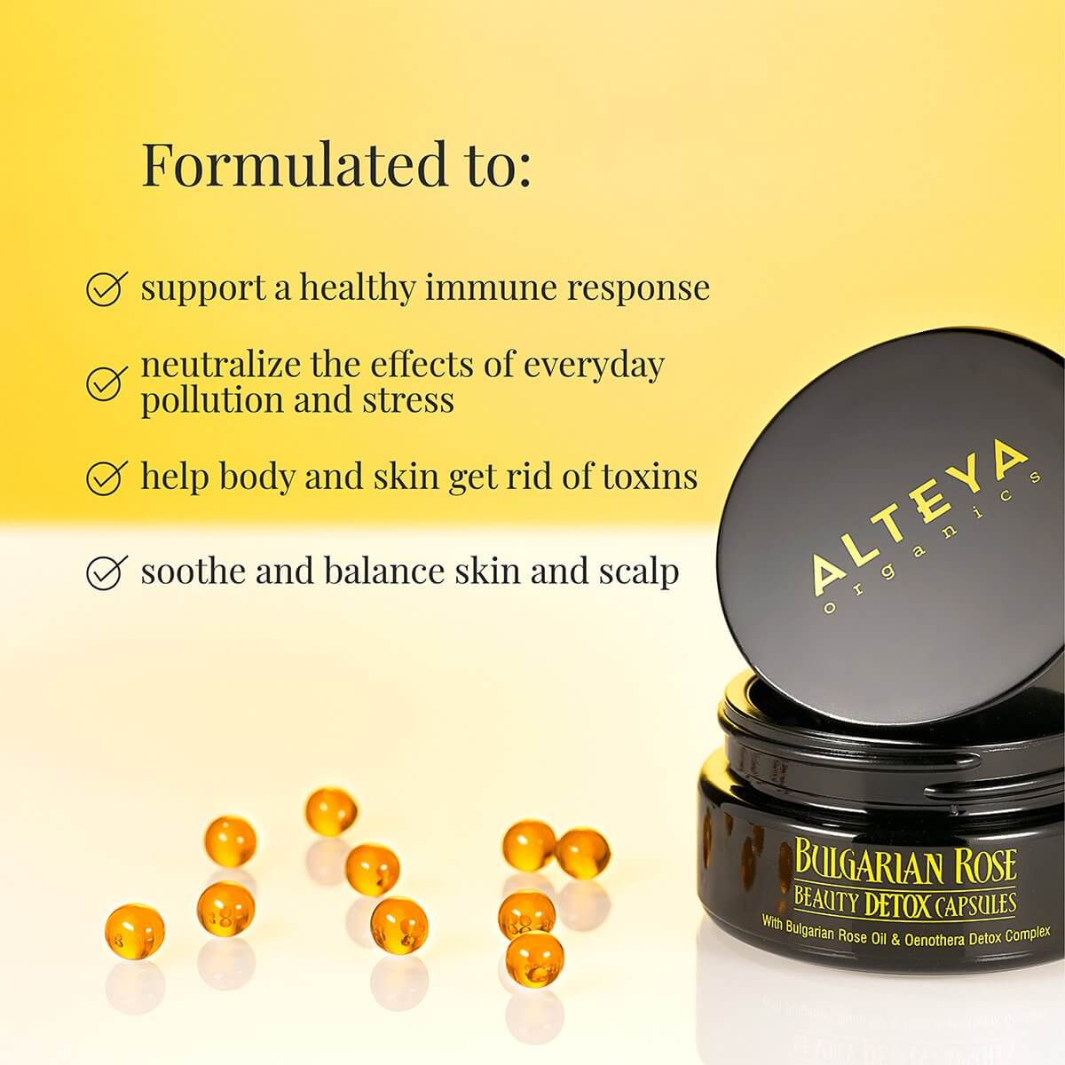A jar with a jar of Bulgarian Rose Beauty Detox Capsules and a jar of oranges infused with Alteya Organics organic rose oil capsules.