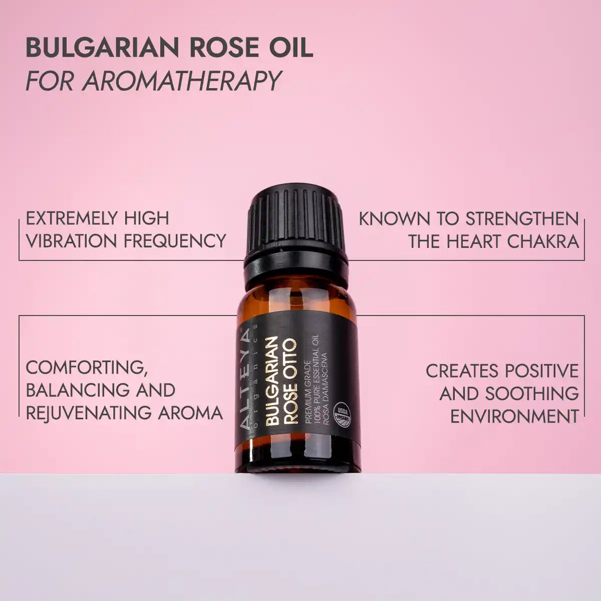 A bottle of Bulgarian Rose Essential Oil - Rose Otto - 100% Pure for aromatherapy with text highlighting benefits such as high vibration frequency, heart chakra strengthening, rejuvenating aroma, and creating a soothing environment.