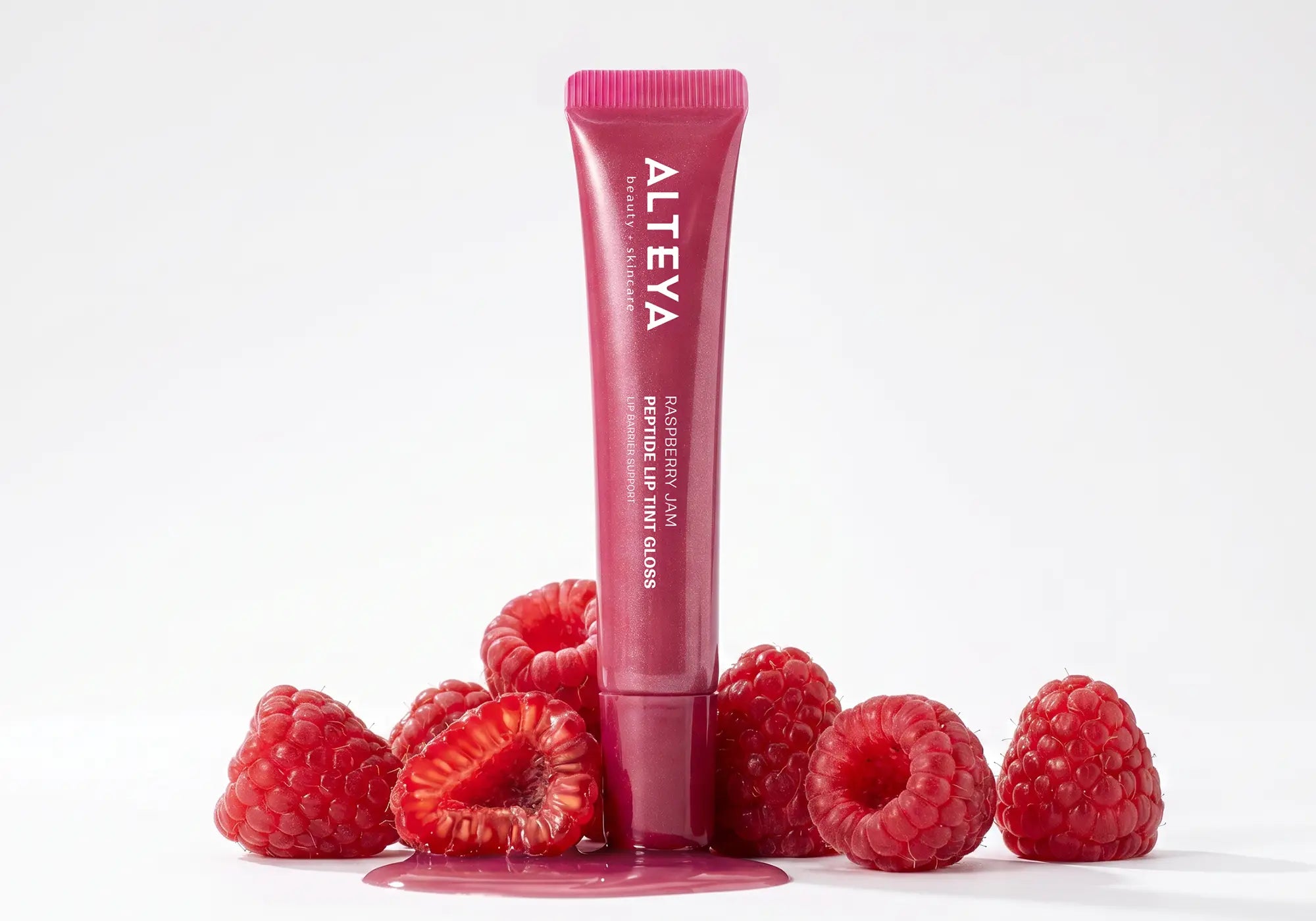 Raspberry jam lip gloss and fruits