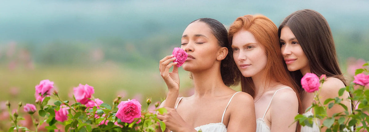 Models in rose fields