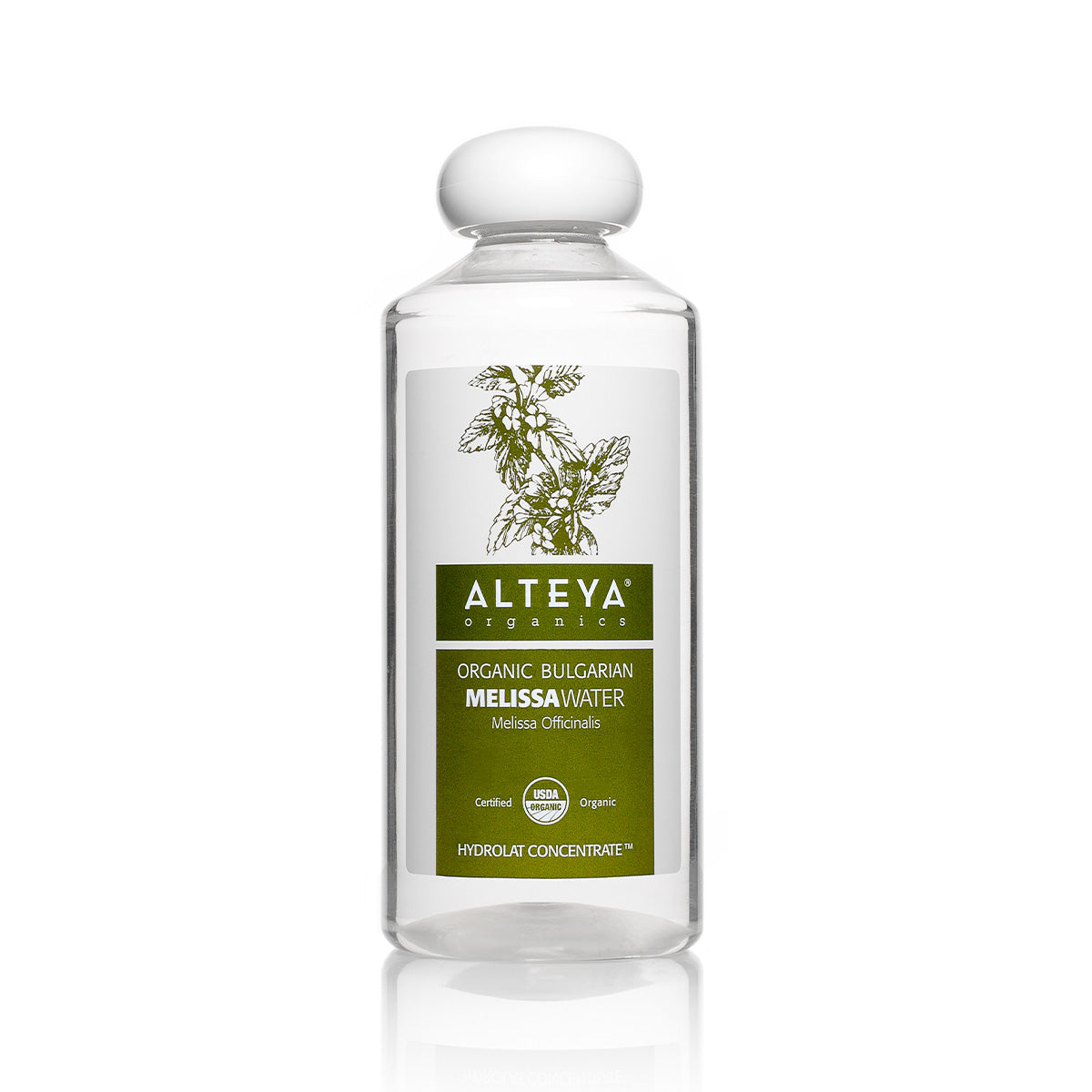 A bottle of Alteya Organics Bulgarian Organic Melissa Water body wash with green leaves on a white background for troubled skin.