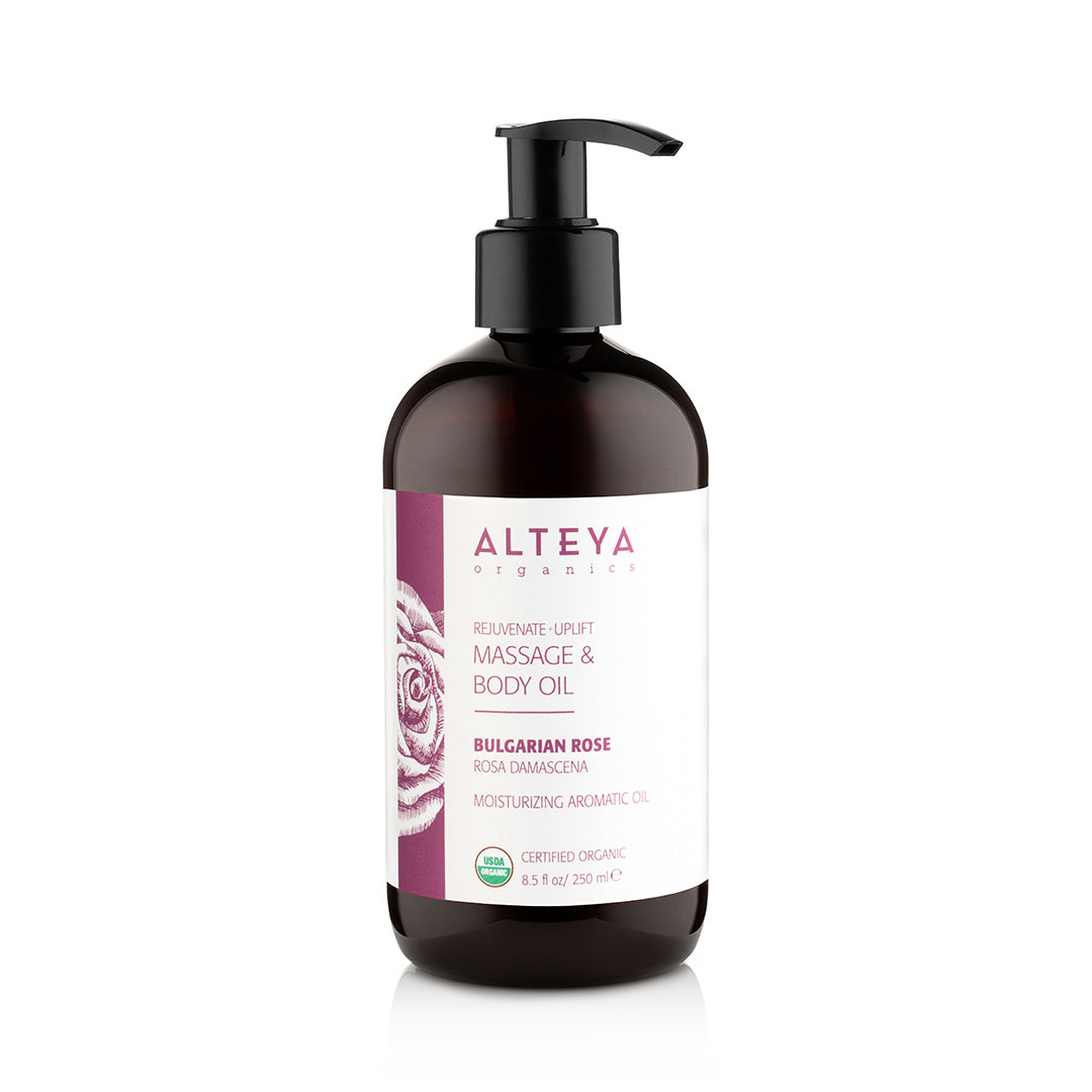 A bottle of Alteya Organics Rejuvenating Massage and Body Oil Bulgarian Rose, designed to moisturize and rejuvenate the skin while providing a soothing aromatherapy experience.