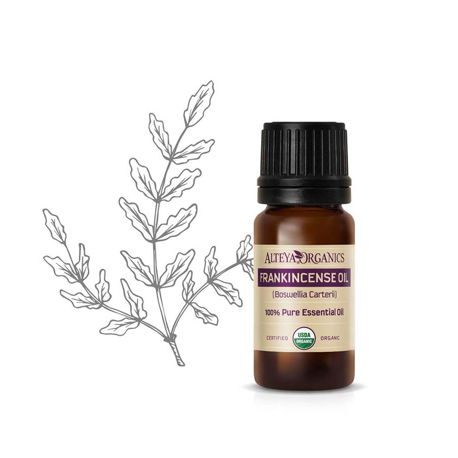 Alteya Organics' Organic Frankincense Oil /Boswellia Carterii/ with a leaf next to it, perfect for skincare routines.