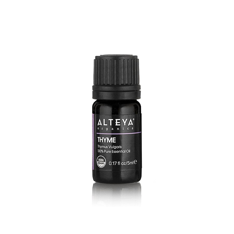 A bottle of Alteya Organics Thyme (Thymus Vulgaris) Essential Oil, a natural antiseptic and promoter of a healthy immune system, on a white background.