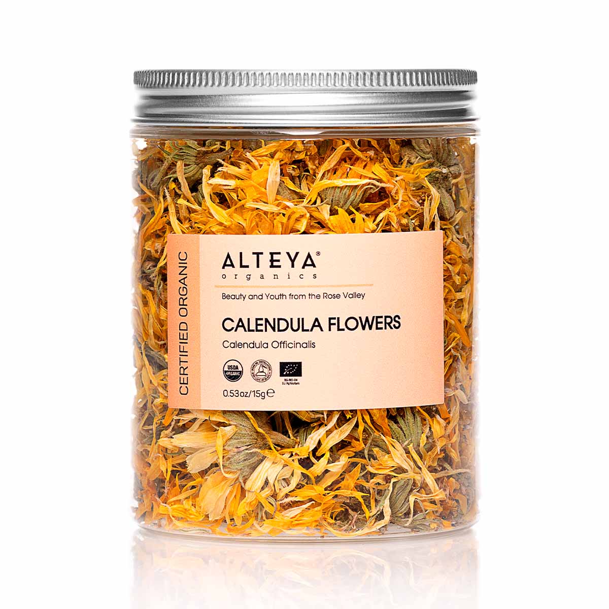 An organic jar of Alteya Organics' Dry Calendula Flowers on a white background exuding wellness vibes.